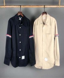 Camisa casual de hombres y mujeres Camisa casual Costa a rayas de algodón Camisa de manga larga Camisa 93748302587887