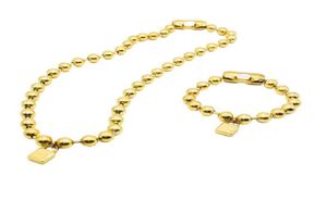 Hommes et femmes bijoux ensemble argenté or en acier inoxydable perles rondes verrouillage clés du bracelet de perle collier 2875274