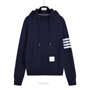 Mannen en vrouwen trui modeontwerper Thombrownsweatshirt Taobao hoodie nieuwe losse vier bar capuchon trui top mannen lange mouwen casual jas