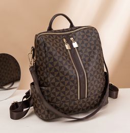 Hombres Mochilas Mujeres Diseñador Bolsos escolares Clásico Impreso Rejilla Mochila Cuerda Hebilla Bolsos para portátiles Mochila de viaje Mujeres Luxurys Bolso de hombro