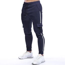 Hommes respirant mince pantalons décontractés Muscle Fitness pantalons de sport bas mâle course formation Leggings Jogging Trackpant 240126