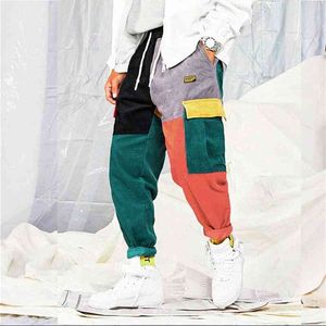 Mannen Cargo Broek Streetwear 2021 Splicing Print Hip Hop Jeans Mode Corduroy Splicing Multi-Craft Harajuku Mode Broek H1223