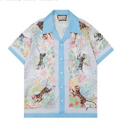 Camisas informales para hombre 2023, marca de lujo con estampado de principios de primavera, camisa de manga corta para la playa, camisas hawaianas con cuello de pico y estampado a la moda para hombre