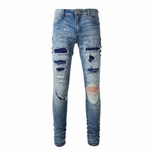 Hombres Crystal Stretch Denim Jeans Streetwear Parche pintado Pantalones cónicos flacos Agujeros Rasgados Pantalones desgastados 61CL #