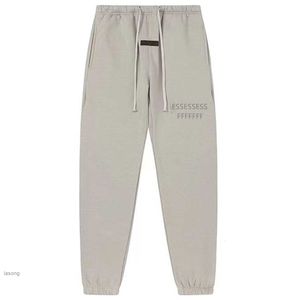 Hommes Essentialspants Pantalons de survêtement en polaire Double ligne Pantalons à cordon Couple Hop Pantalons Poches latérales Poches légères et amples High Street Pantsjk8e