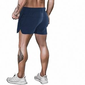 Hommes Fitn Sports Shorts Stretch séchage rapide pantalons courts chauds musculation course basket-ball Squat Shorts Z7CB #