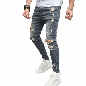 Mannen Hip Hop Spikkel inkt Stretch Gaten Skinny Potlood Jeans Stijlvolle Gescheurde Mannelijke Casual Cott Denim Broek Voor Herenkleding d1yI #