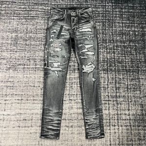 HOMBRES Jeans Jeans ajustados ocasionales Diseñadores para hombre Pantalones elásticos Jean Edredón de letras de cuero a juego negro Pantalones rectos rasgados hasta la rodilla Hip hop Street Pant