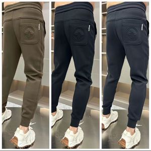 Hommes Joggers marque mâle pantalon pantalons décontractés pantalons de survêtement survêtement mode automne hiver Fitness entraînement pantalons de survêtement taille asiatique M-5XL