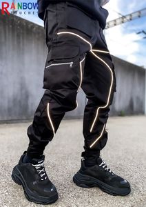 Hombres Pantalones deportivos al aire libre Cortavientos Multi bolsillo Raya reflectante Casual Cargo Pantalones deportivos Calidad superior Rainbowtouches 220713