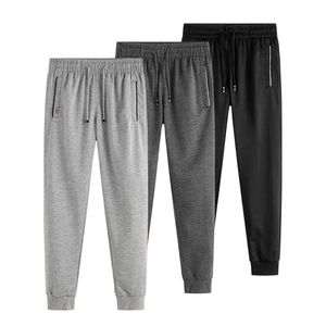 Los pantalones de los hombres del verano sueltos pantalones delgados se mantienen frescos en los días causales malos joggers tamaño M a 5xl 211201