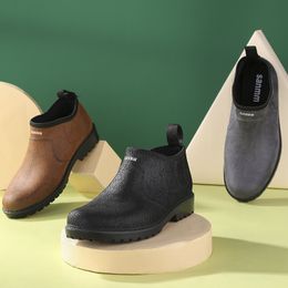 Botas de lluvia para hombre, zapatos de goma tobilleros de diseñador a la moda, zapatos de trabajo y seguridad impermeables de PVC, botas de goma para pesca y marido