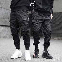 Pantaloni da uomo a blocchi di colore con nastri neri Pantaloni da jogging Harem cargo con tasca nera Pantaloni hip-hop con pantaloni sportivi Harajuku 15
