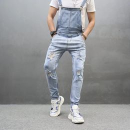 Des hommes de biker mince jean bib bilans combinaison jeans streetwear streetwear stret stretcharees mâle sangle 240417