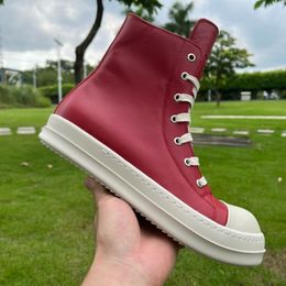 Chaussures décontractées pour hommes et femmes en cuir véritable chaussures à semelles épaisses couples couche supérieure rouge en cuir de vache hauteur augmentée bottes courtes polyvalentes chaussures de sport