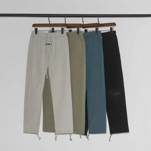 Pantalones para hombre y mujer 2022 Fashion High Street Brand Ess Far Double Line 3m Reflective Nylon Usw9