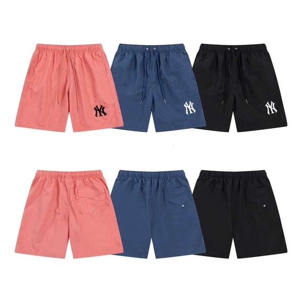 Pantalon de plage d'été masculin et féminin, Brand de soie de soie rouge sur Internet Five Point Shorts, sports décontractés 24 nouveaux styles