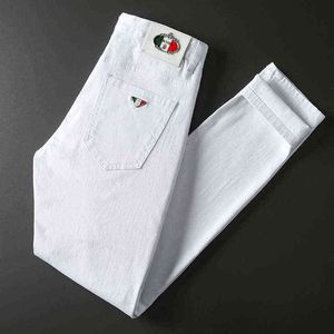 Jeans d'automne pour hommes Pure White Cotton Elastic Small Feet Slim Fit Korean Simple Pants
