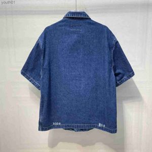 Chemises décontractées pour hommes Vêtements de vêtements pour hommes Chemises de créateurs de taille US Version lâche de Blue Casual Jeans Shirt High Quality Imingted Design Hommes Luxury Men Shirts