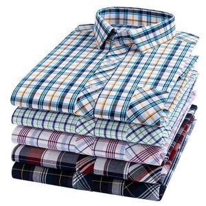 Chemises décontractées pour hommes Nouveaux chemises décontractées en coton pour hommes Long Slve Fashion Imprimer régulièrement des chemises à plaid pour hommes à carreaux
