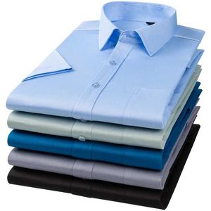 Chemises décontractées pour hommes Nouveau quatre côtés élastique couleur unie court traîneau hommes chemise mode décontracté affaires pas de vêtements pour hommes professionnels BlusasC24315