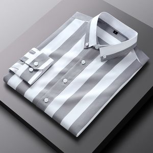 Camisas informales para hombres Camisa juvenil de manga larga con rayas verticales versión coreana para hombres de la tendencia informal de negocios 221117