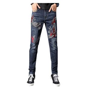 Chinese draak borduurjeans voor heren Mode geborduurde slanke rechte stretch denim broek Trousers227S