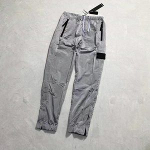 Vêtements masculins Top Mens Pantalon Brand Travel Retro Sweat Pant Détails Metal Nylon Mesh Breath Feet Feet Zipper Pantalon rétréci pour Down1996