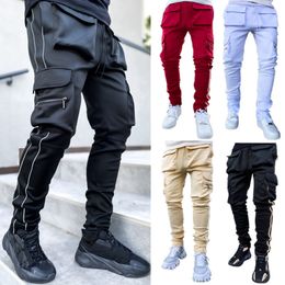 Heren Designer Cargobroeken Lente Herfst Winter Zwart Modieus Stretch Multi-Pocket Reflecterend Hiphop Recht Pantalones Sport Fitness Vrijetijdsbroeken Joggers