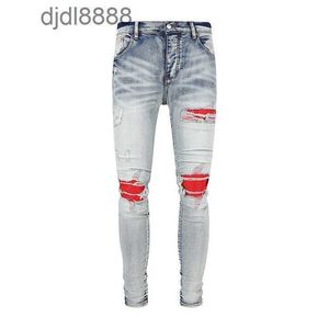 Pantalons de créateurs pour hommes 2023 Nouveau jean bleu rouge en cuir fendu mode hommes