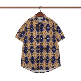 Camisa de diseñador para hombres Summer manga corta botones casuales camisa de bolos estampado estilo playa de camiseta transpirable ropa G35