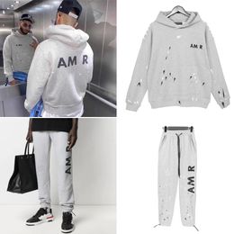 Survêtement de designer pour hommes hommes femmes terry logo broderie encre mouchetée pull à capuche avec pantalon vêtements pour hommes sweats à capuche de sport survêtements manteau pour hommes AM1