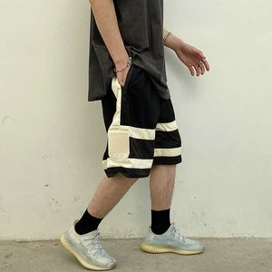 DP hommes noir et blanc couture ample grand genou Mesh Shorts décontracté Capris haute rue mode brodé pantalons de survêtement