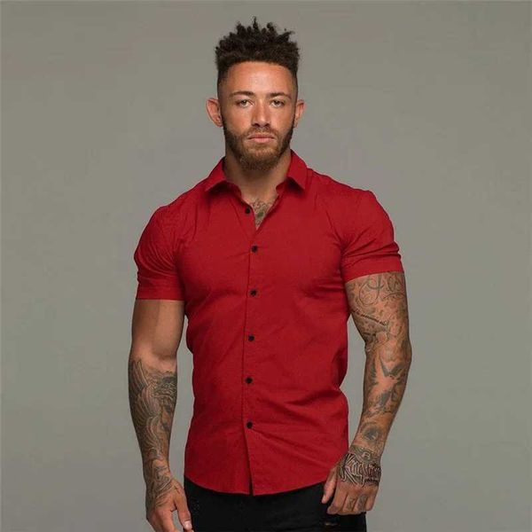 Chemises de robe masculine Mode Summer Short Slet Men Solid Er Slim Fit Social Business Dress Shirt Men Gym Fitness Sport Vêtements D240507