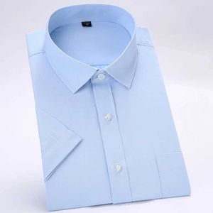 Chemises de robe pour hommes Mentins d'été plus taille courte de robe à couches courte de poche unique Pocket standard-ateple Formal solide / serppe / chemises décontractées ordinaires D240507
