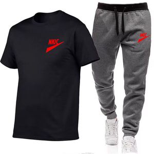 Mode masculine chemise survêtement deux pièces ensembles hommes décontracté Fitness Sport costume à manches courtes t-shirt pantalon hommes décontracté Sportswear costumes marque LOGO imprimer