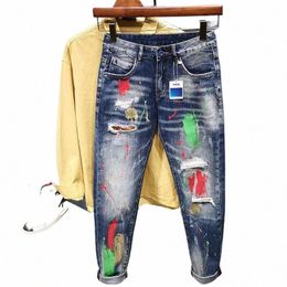 Mannen Graffiti Jeans Fi Verf Gescheurd Gat Persality Hiphop Streetwear Mannelijke Kleding Slanke Jeugd Denim Broek z8UZ #