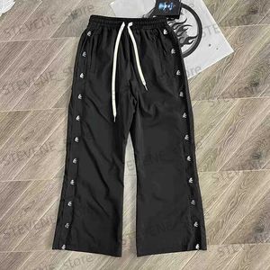 Hellstar ci cire le nylon bouton hommes femmes 1 pantalon de crampons noir surdimensionné de qualité supérieure T231214