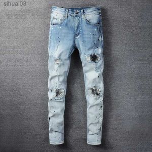 Jeans masculin 2022 Jeans graphite pour hommes Vêtements de rue Ultra-Thin jeans noirs hommes homme trou de pantalon en denim déchiré