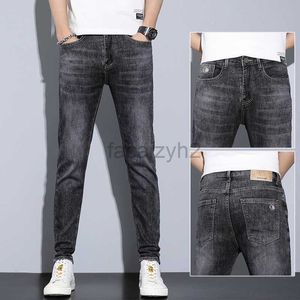 Jeans masculins 2022 printemps / été nouvelle édition coréenne édition masculine jeans élastique slim fit leggings jeans masculin jeune pantalon gris pantalon plus taille pantalon
