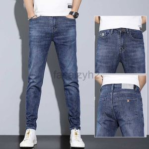 Jeans masculin 2022 printemps / été de la nouvelle édition coréenne de coréenne jeans élastique slim fit leggings jeans masculins jeunes pantalon bleu plus