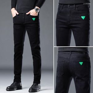 Pantalones vaqueros para hombre 2023 Otoño Invierno diseño Slim Fit elástico negro verde Logo moda Casual pantalones de mezclilla buenos pantalones de algodón para hombre