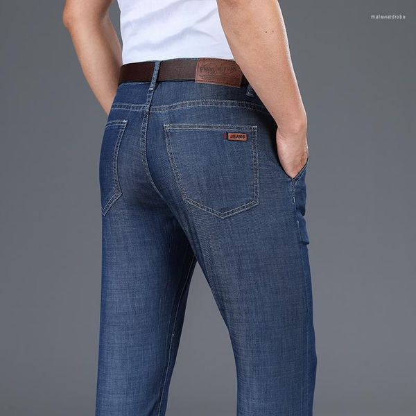 Jeans homme 2023 décontracté mode intelligente pantalon ample léger printemps été classique grande taille 28-42 bleu noir