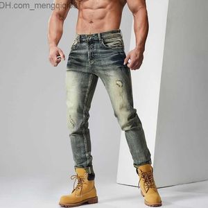 Jeans masculins 2023 printemps / été nouveau classique à la mode confortable rétro ouvert petit pieds petits pieds décontractés slim élastique jeans de haute qualité Z230814