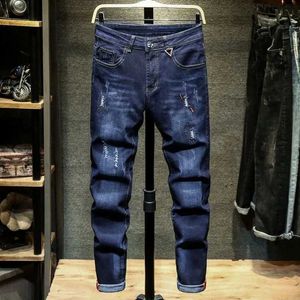 Jeans masculins 2024 printemps / été nouvelle tendance mode couleur de couleur de couleur un jean élastique élastique décontracté