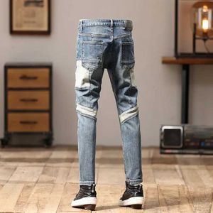 Jeans masculin 2024 high-end couture à la tendance de la rue rétro conception personnalisée pantalon de moto skinny Q240509