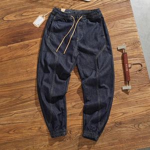 Jeans pour hommes automne et hiver rétro américain processus de fil brillant patchwork ajusté coupe tridimensionnelle pieds groupés salopette