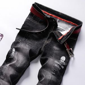 Heren jeans herfst en winter jong met gescheurde borduurwerk schedel print slim fit broek stretch bedelaar casual broek