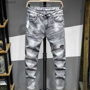 Heren jeans herfst heren mode jeans mode grijze slank fit conische denim broek letters borduurwerk trend jeugd hiphop street clothingl2403