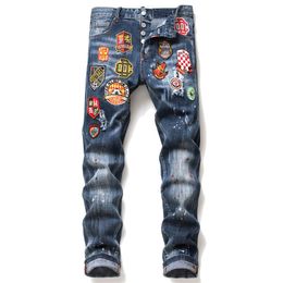 Herenjeans Gebroken en spattende verf, heren slim fit, gaten, meerdere badges, elastiek